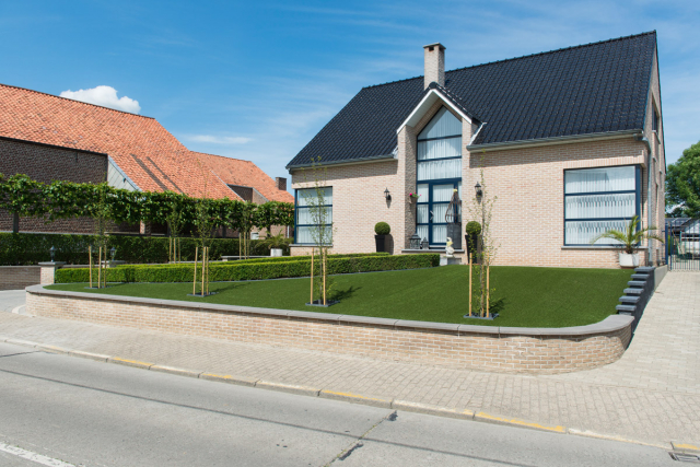 artificial grass installed in a front garden of a home