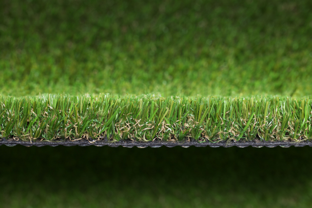 Why are there brown curls in fake grass?